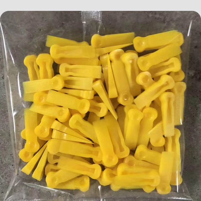 Yellow small tile spacers
